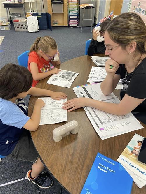 Teacher with Students